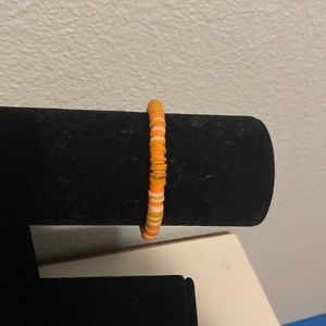 Orange homemade clay bead bracelet